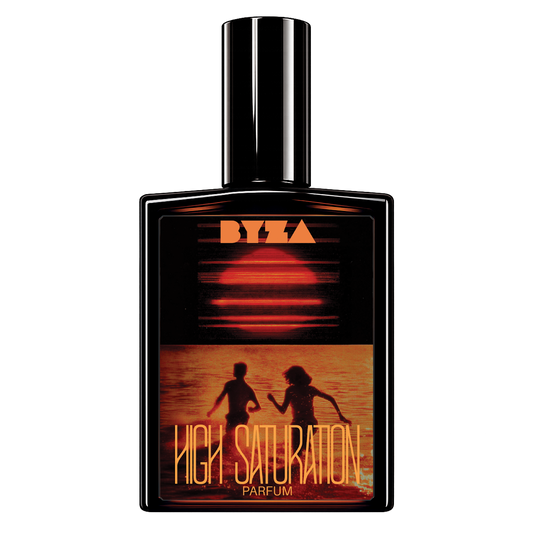 BYZA perfume bottle with a glossy black cap and a label featuring a sunset scene with two silhouetted figures and the 'BYZA' logo and 'HIGH SATURATION PARFUM'.