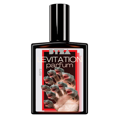 A perfume bottle with a black cap and a square black glass body, featuring a front label for 'levitation parfum' with shark illustrations and red graphic accents, on a plain white background.